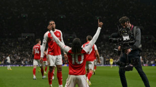 Arsenal's Eze sinks Spurs again, Liverpool late show floors Forest