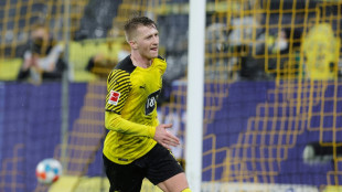 Überragender Reus im Sauwetter: BVB bleibt an Bayern dran