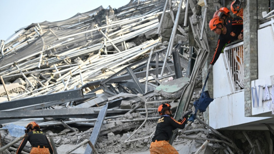 Rescuers search for 20 missing after Philippine building collapse