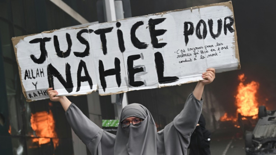 Policeman charged in French teen's killing as outrage builds