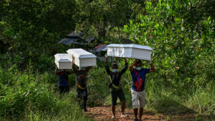 Bodies of Philippines ferry fire victims brought ashore as toll hits 35