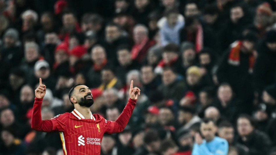 Liverpool's magnificent seven secures Champions League progress