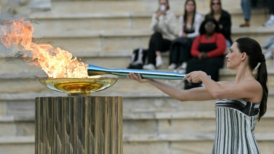 2026 Winter Olympics flame handed to Milan-Cortina organisers