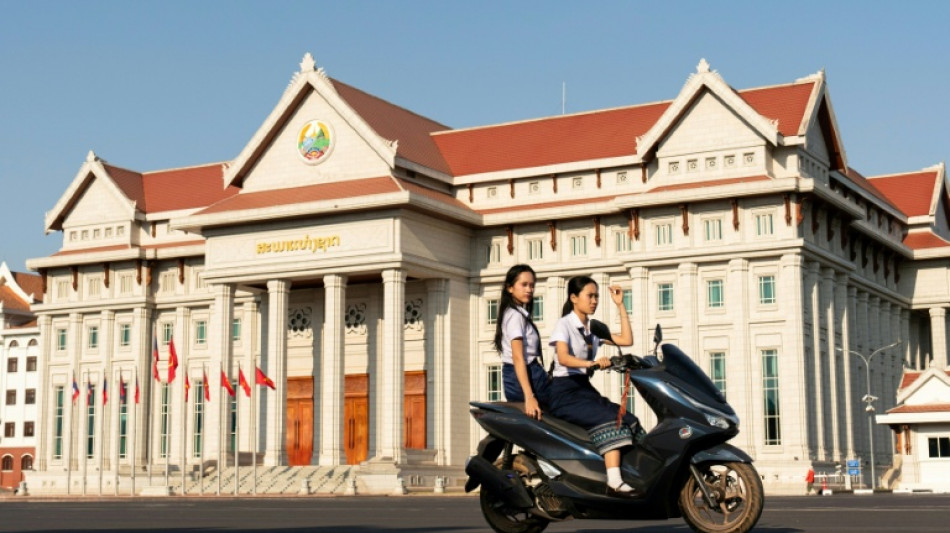 Outspoken Laos lawmaker's election exit sparks rare dissent