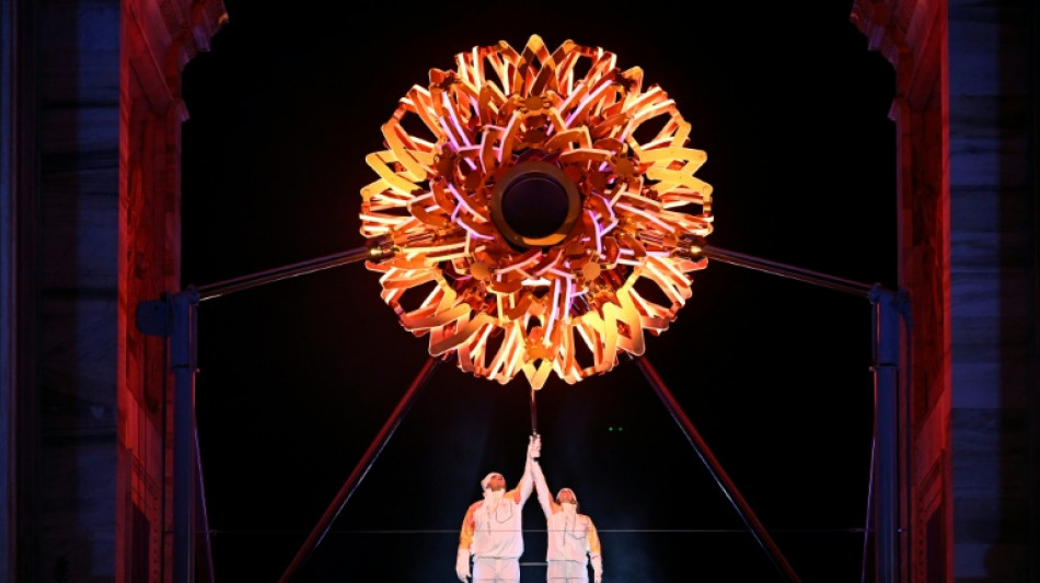 Milan-Cortina Winter Olympics open with dazzling ceremony