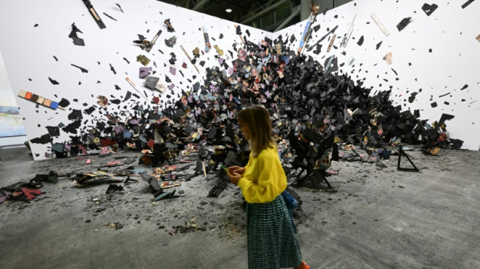 Moon sculptures, NFTs at futuristic Art Basel fair