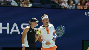 Weary Swiatek wins US Open mixed doubles opener
